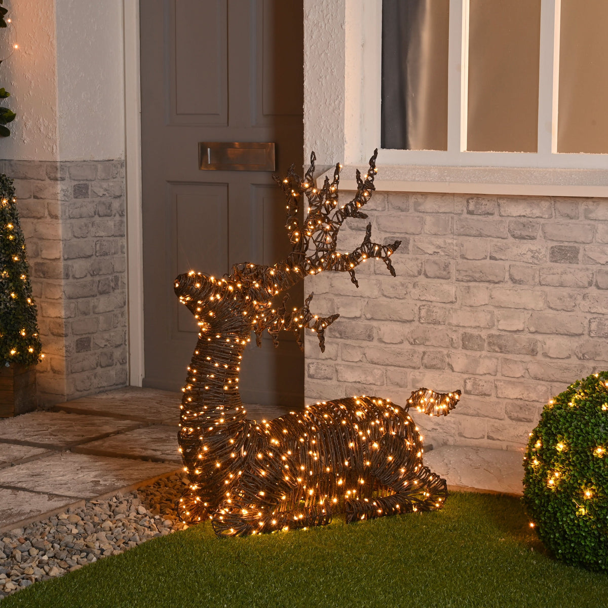 Festive 88cm Lit Antique LED Brown Rattan Sitting Reindeer