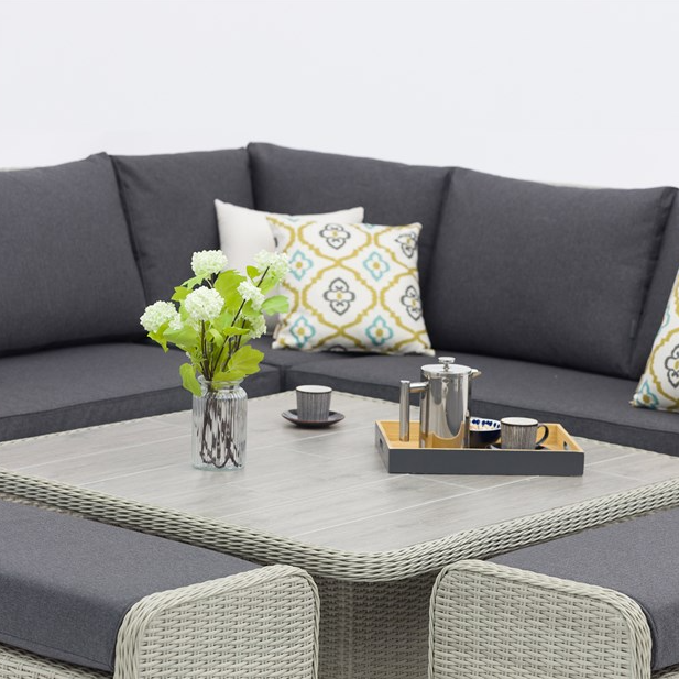 Product Bramblecrest Chedworth Dove Grey Rattan Reclining Corner Sofa with Square Dual Height Table & 2 Benches