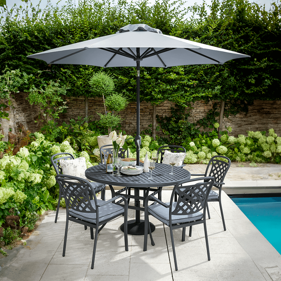 Berkeley 6 Seat Round Dining Set in Antique Grey / Platinum with base & parasol by Hartman, Northern Ireland