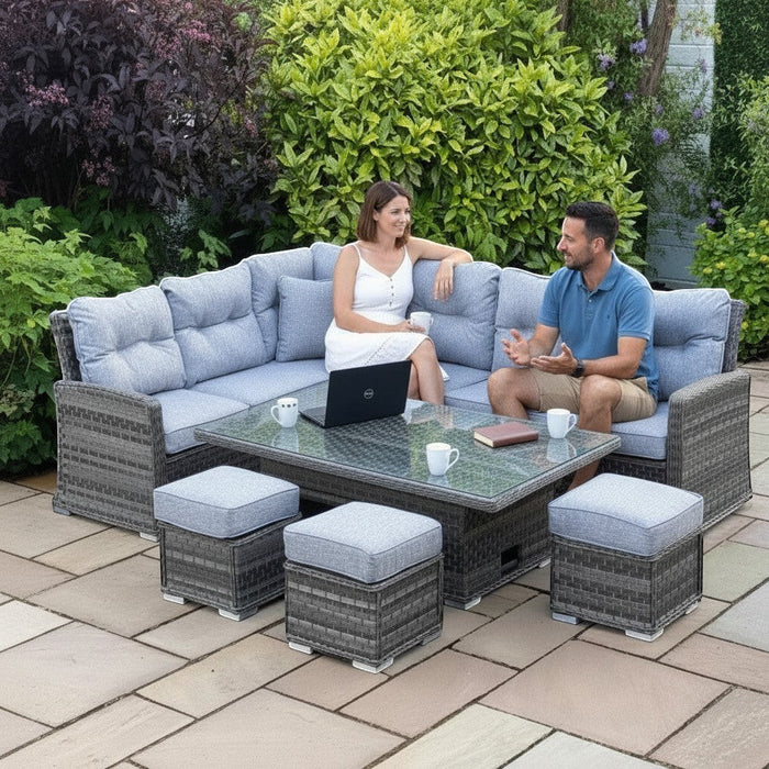 Mid Ulster Garden Centre Amalfi corner sofa set with grey synthetic rattan, plush cushions, and adjustable table.