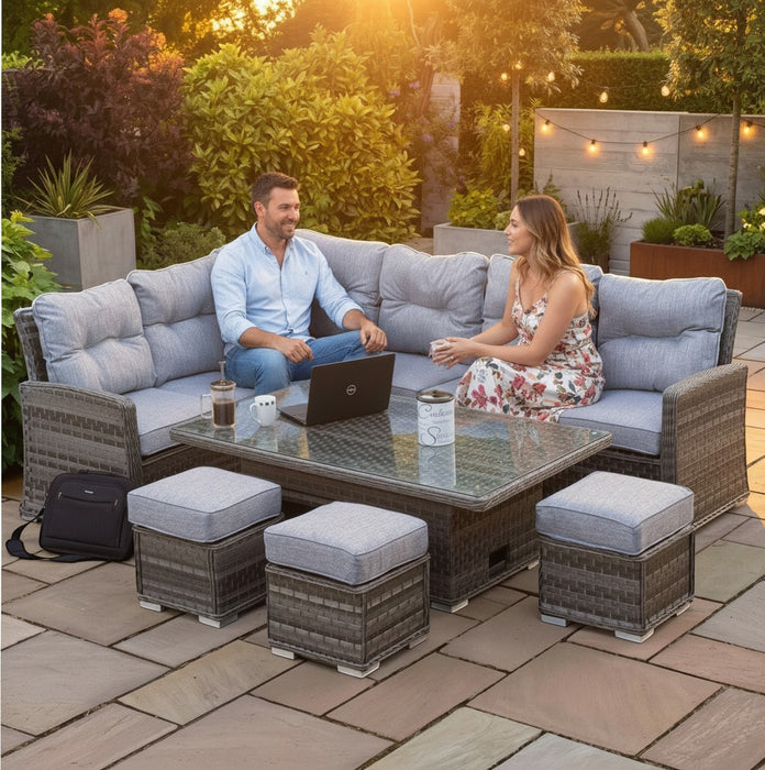 Mid Ulster Garden Centre Amalfi corner sofa set with grey rattan, plush cushions, and a rising table on a patio.