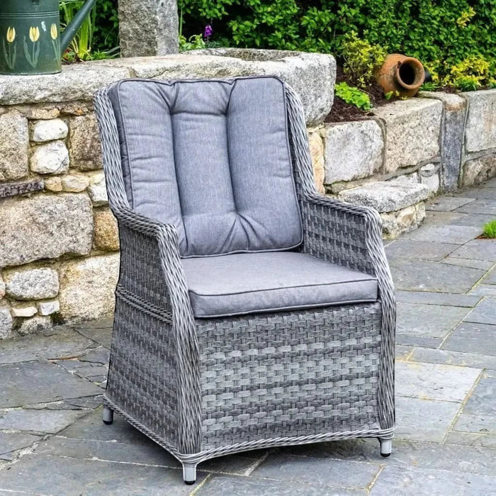 Mid Ulster Garden Centre Bali grey synthetic rattan dining chair with plush grey cushions on a stone patio