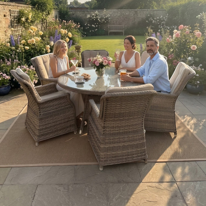Mid Ulster Garden Centre Hampton 6 seat light brown synthetic rattan dining set with round glass table in a garden