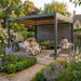 Mid Ulster Garden Centre Hartman 3m x 3m Como Pergola in Matt Xerix with louvered roof and LED lights in a garden.